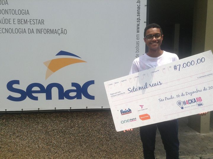 Humberto with the prize check